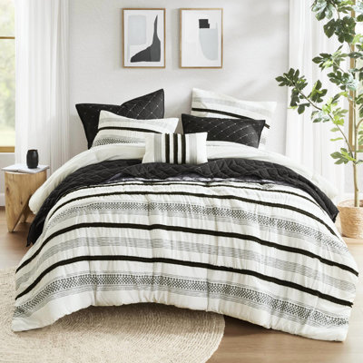 King/ King 7 Piece Comforter And Quilt . Crafted From Microfiber. Provides Exceptional Coziness. Soft Plushy. Stylish Stripe Pattern. Adapts To Different Bedroom Decor. Wrinkle Shrinkage . Simple