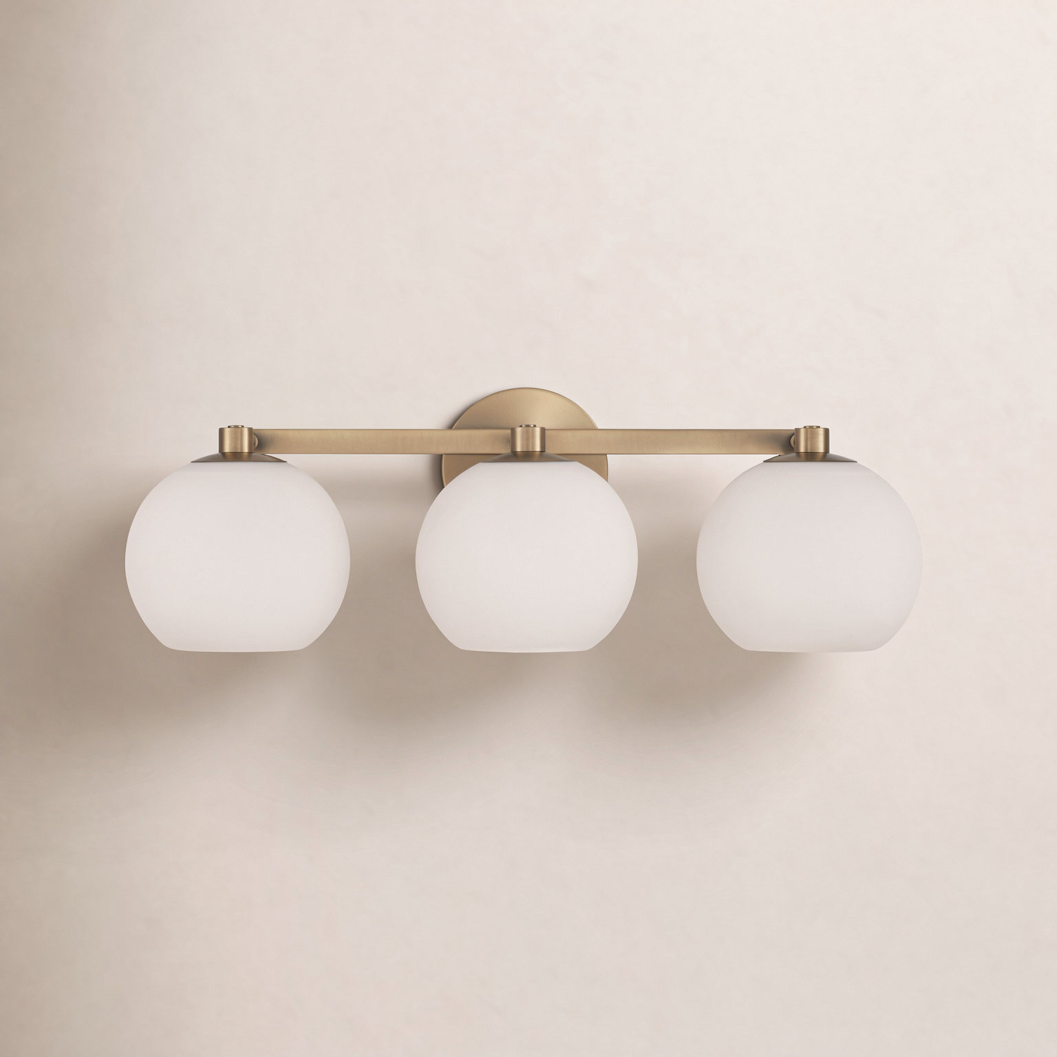 Ansley 3 Light Frosted Dimmable Vanity Light, Aged Brass