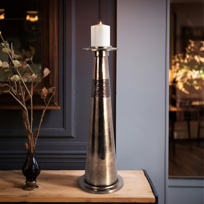 Modern Glass and Aluminum Pillar and Taper Holder with Sculptural Metallic Form and Wrapped Midsection Detail for a Sleek Decorative Accent in Contemporary Stylish Home Decor Settings