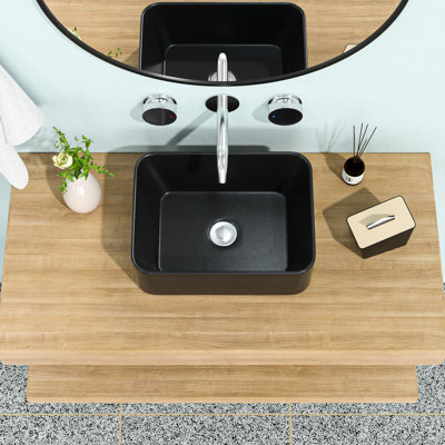 Lavabo rectangulaire en céramique noir mat de 40,6 x 30,5 cm. Design européen épuré. Qualité supérieure, faible absorption d'eau, anti-taches. Installation sur plan. Bonde centrale de 4,4 cm.