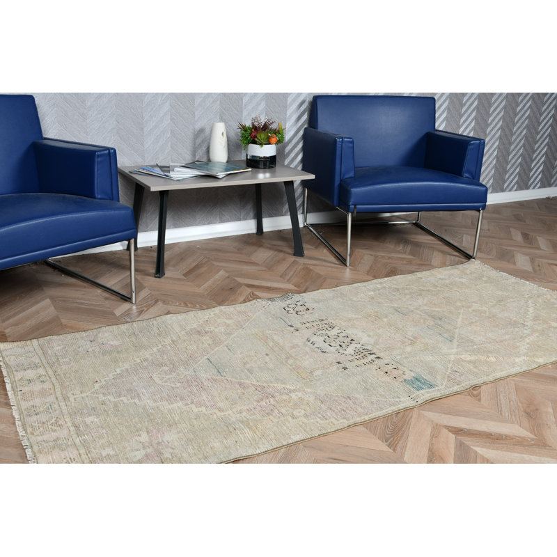 Tapis turc doux de couleur pastel rétro avec motifs géométriques pour un décor de plancher unique de style antique