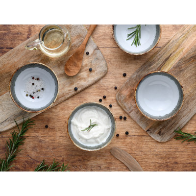 The Cascade Blue Dipping Bowl is a 6 piece dinnerware set made of stoneware