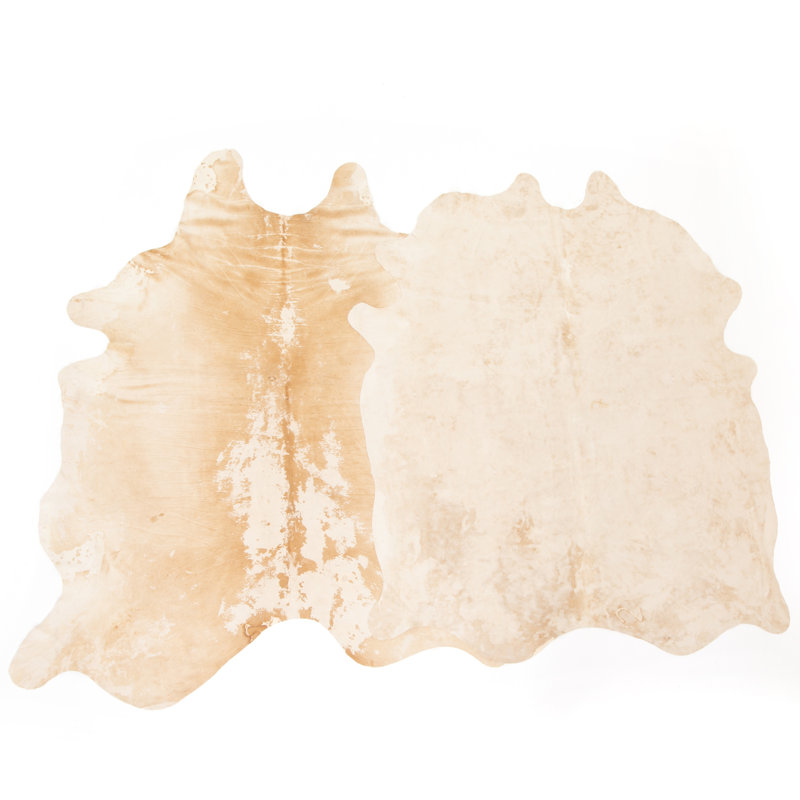 Harland Cowhide Animal Print Area Rug in Ivory