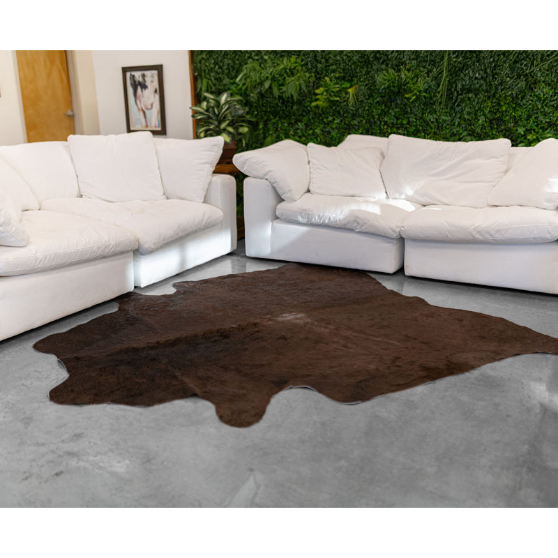 Tapis brun en cuir de vache fabriqué à la main