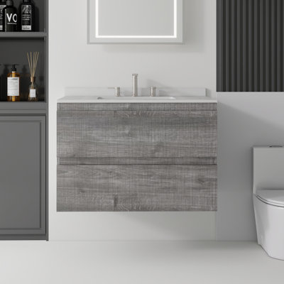 Meuble-lavabo suspendu de 76 cm (30 pouces) avec lavabo en céramique, armoire en contreplaqué, tiroirs à fermeture amortie, comptoir et dosseret en marbre reconstitué blanc granit, gris
