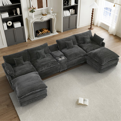 141-inch seven-piece sofa set, with a center console, coffee table and six pillows, suitable for spacious living rooms and meeting rooms.