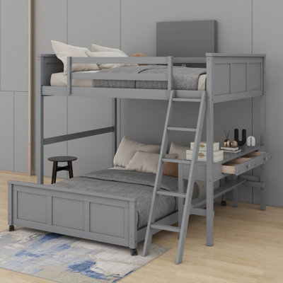 Lit double superposé au dessus d'un lit double avec bureau