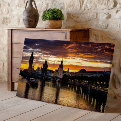 Canvas A Breathtaking Sunset Scene Over A Historic Cityscape Featuring Iconic Wall Art Architecture With Intricate Details The Sky Is Canvas Wall Art