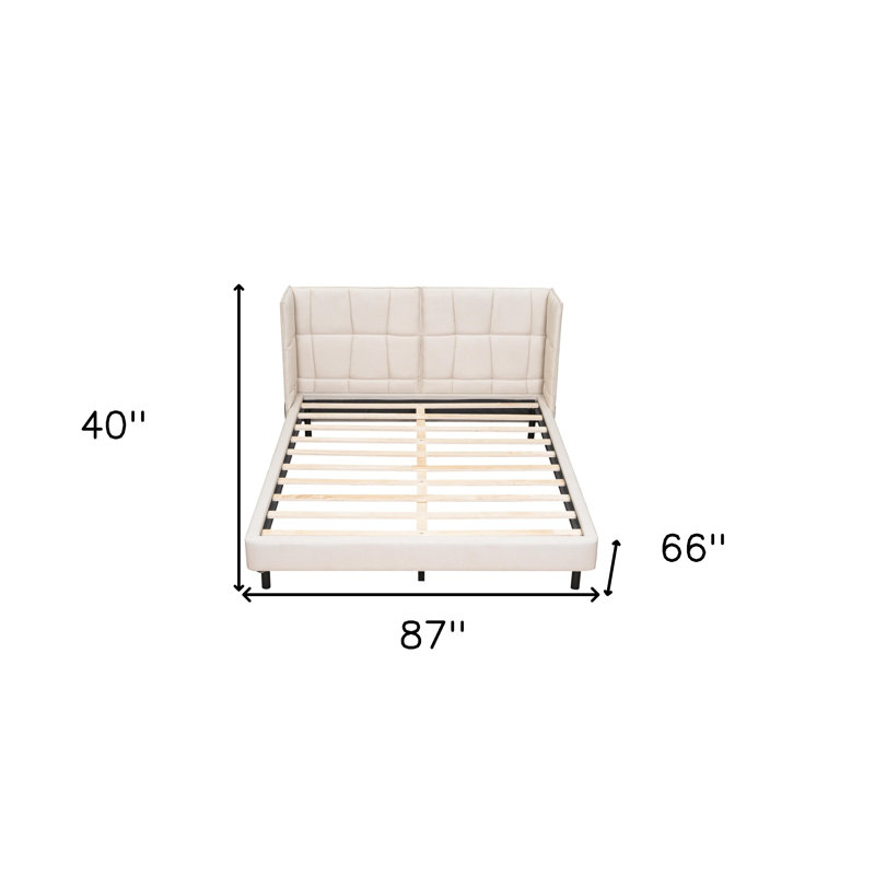 Structure de lit tapissier beige capitonné avec éclairage DEL et USB
