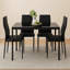 Ensemble de salle à manger moderne 7 pièces avec table en verre et 6 chaises rembourrées, structure en similicuir et acier, conception peu encombrante
