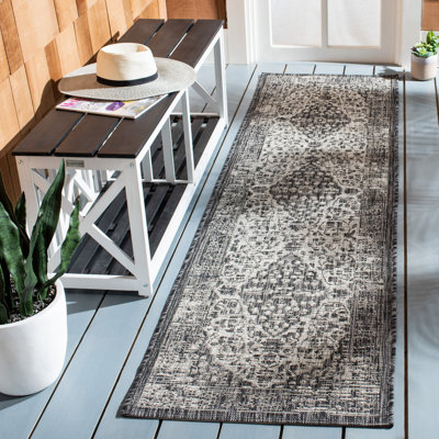 Arneshia Oriental Indoor/Outdoor Area Rug