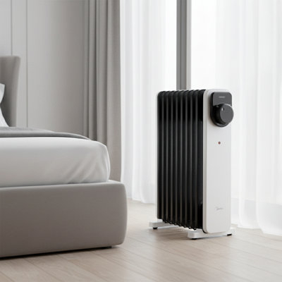 Living And Home 1000 Watt 3412 BTU Electric Radiator Space Heater with Adjustable Thermostat