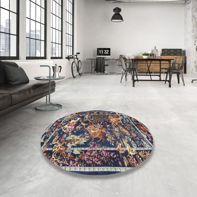 Tapis floral bleu foncé / brun à motif floral