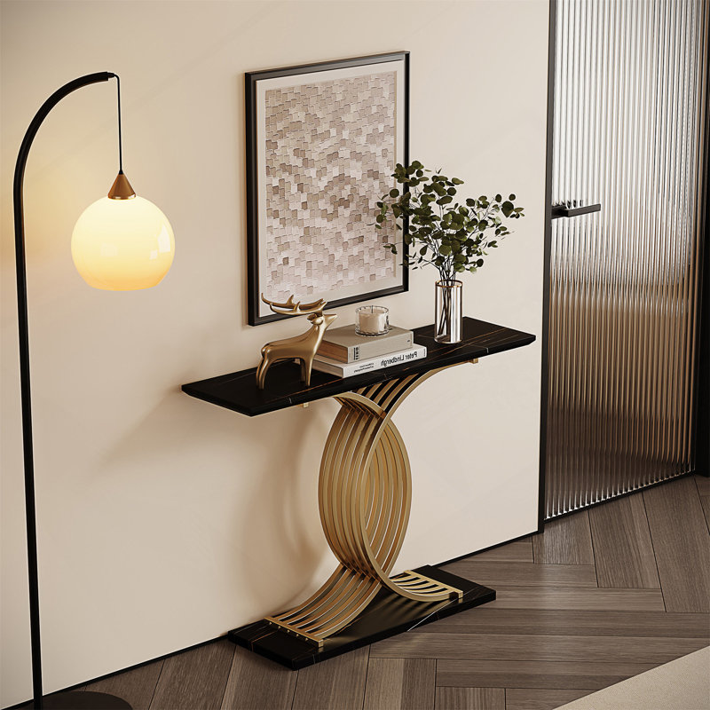 Console décorative au design luxueux noir et or clair, surface résistante aux égratignures et profil mince compact pour les vestibules modernes.
