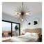 Lustre Sputnik moderne à 7 lumières en métal noir, style étoile, avec chaîne réglable, idéal pour salle à manger ou chambre.