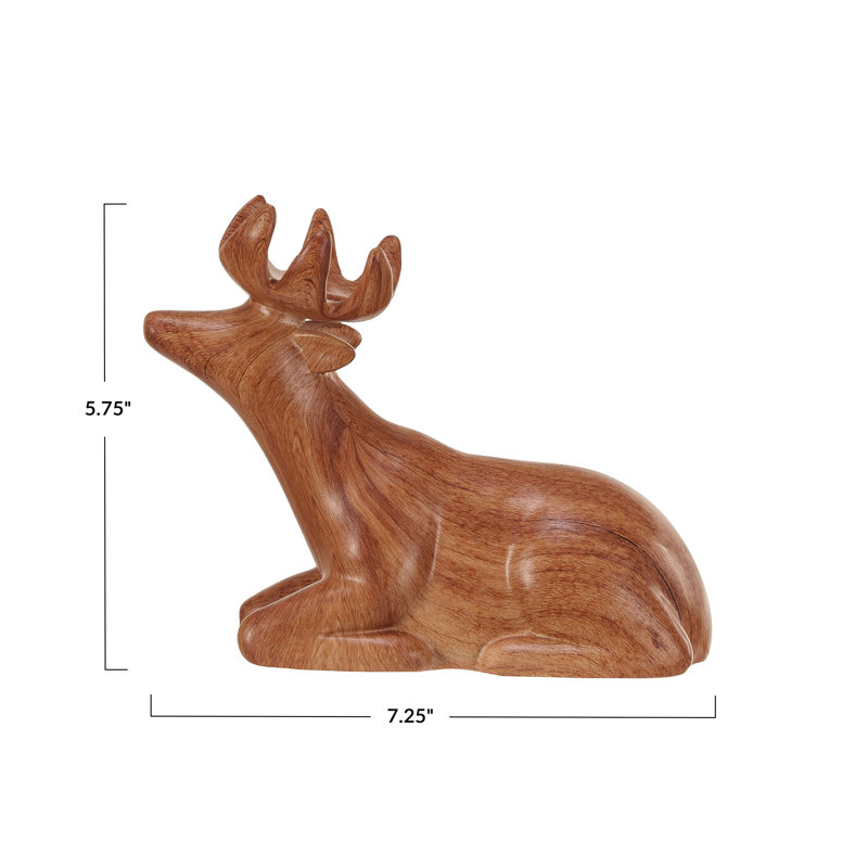 Cerf couché en grès avec finition en bois
