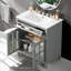 Ce meuble-lavabo comprend un lavabo en céramique, des tablettes réglables, un plateau réversible, des pieds en bois massif, des boutons en métal et des charnières rembourrées pour une conception réfléchie.-395033071