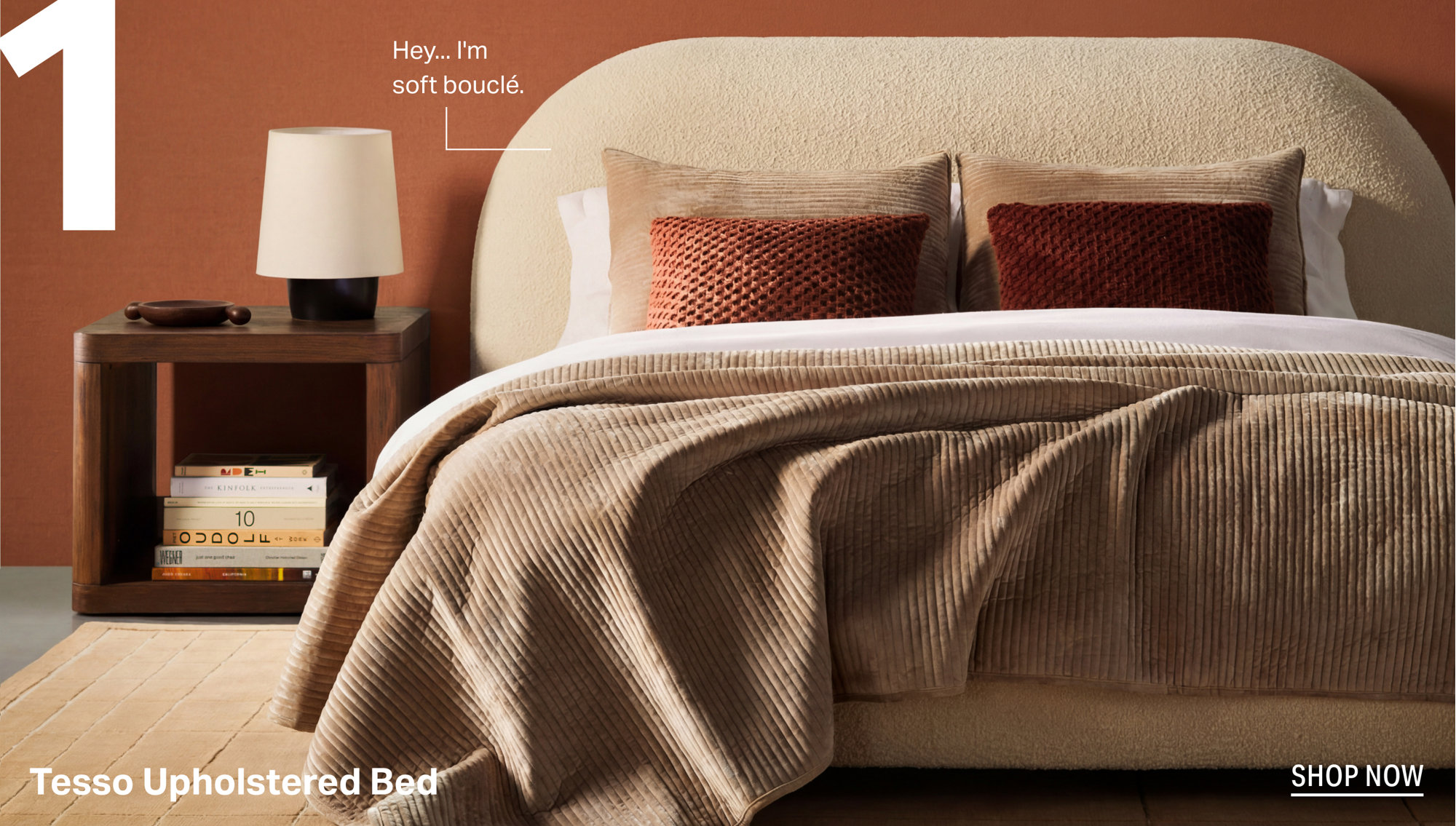 The number 1 with text that reads Hey... I'm soft bouclé, featuring a Tesso Upholstered Bed with a cream-colored curved headboard and a ribbed brown velvet quilt.