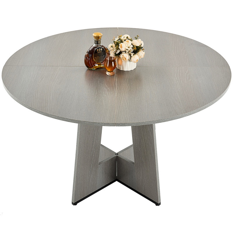 Table ronde grise de 119 cm (47 po), dessus stratifié, idéale pour les réunions de famille. Table grise 4/6, structure stratifiée, spacieuse, parfaite pour la lecture.