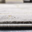 Tapis gris et or à motif abstrait Swindle-1773938075