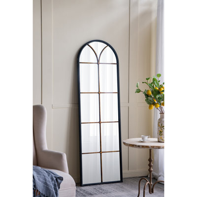 Miroir mural arqué noir et doré