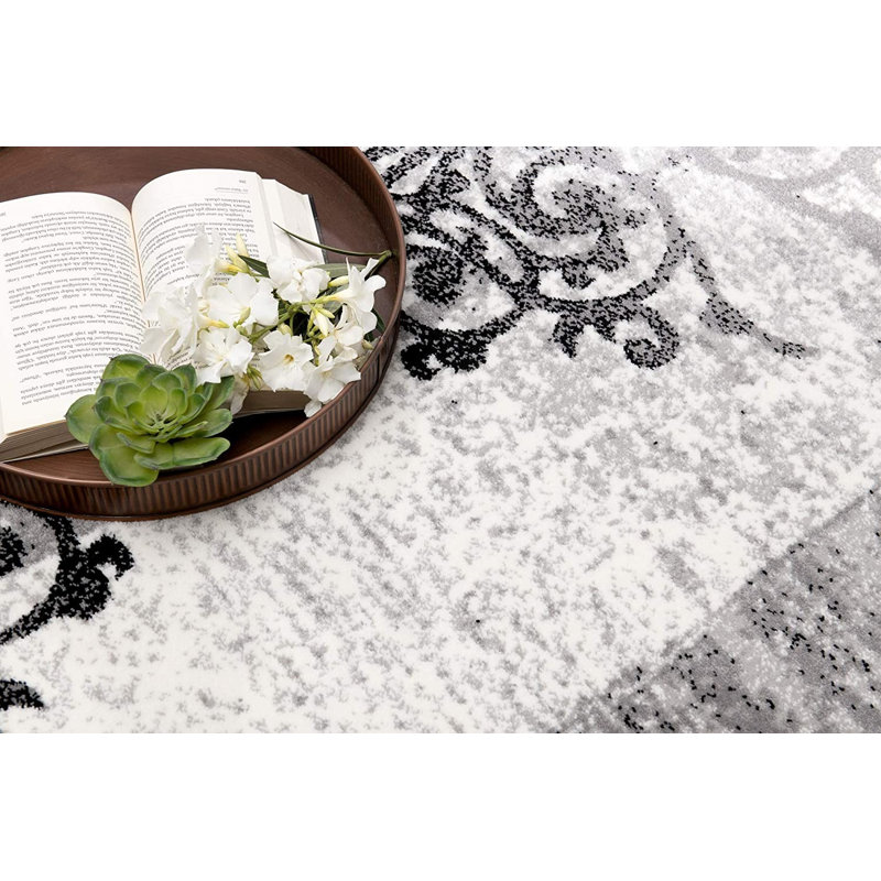 Tapis gris en polypropylène tissé à la machine Yanelys