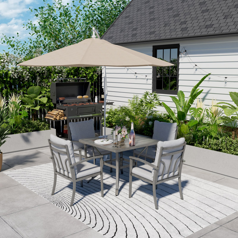 Fauteuil de patio pivotant avec coussin Houser