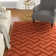 Tapis décoratif en laine tissée à la main de couleur rouge foncé Villegas