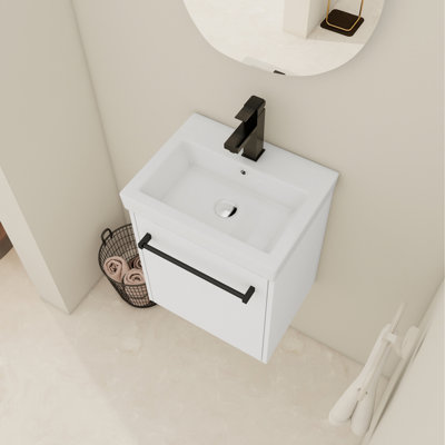 Armoire de salle de bain avec lavabo en céramique. Fonction flottante à fermeture en douceur. Attrait moderne pour les petites salles de bain. Base de contreplaqué 18 po. Porte silencieuse. Regardez les espaces. Fabrication