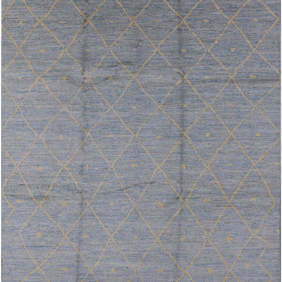 Tapis bleu à motif géométrique