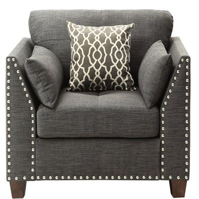 Fauteuil d'appoint gris anthracite avec accoudoirs évasés et coussins confortables assortis