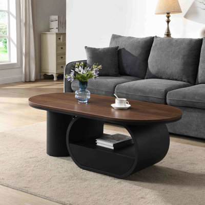 Table basse ovale de luxe de style industriel (120 cm), avec tiroir de rangement en métal noir, idéale pour le salon. Montage facile et stable.
