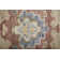 Caelinn Wool Floral Area Rug