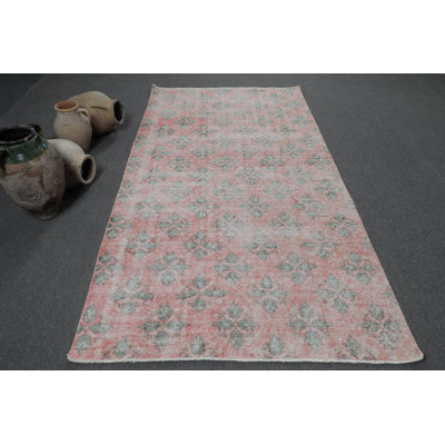 Handcrafted Turkish Rug With Pink Floral Pattern Perfect For Ethnic Home Decor And Unique Indoor Floor Accentuation