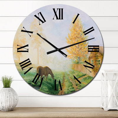 Horloge murale dans un paysage champêtre