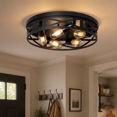 Ensemble de plafonniers ronds de style industriel noir mat à cinq ampoules avec cages métalliques ajourées qui conviennent aux couloirs, aux cuisines et aux entrées. Ampoules non incluses.