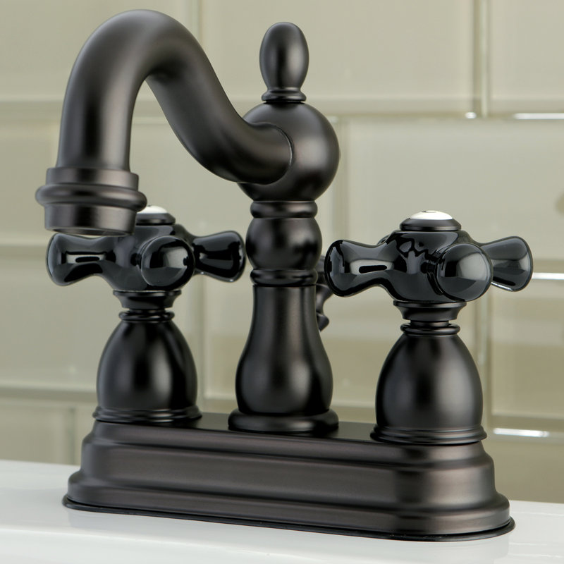 Kingston Brass Duchess Two-Handle 3-Hole Deck Mount 4" Centerset Bathroom Faucet with Plastic Pop-Up, Oil Rubbed Bronze