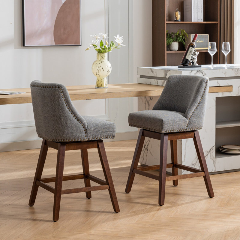 Counter Height Swivel , 26'' Seat Height. Of 2 Gray Upholstered Bar Stools With 360 Rotatable Function. Soft Foam And Steel Spring Filling For Extended Sitting Time. Curved Back Support. Made
