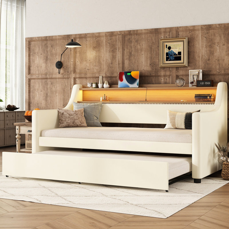 Lit de jour simple avec lit gigogne en blanc, lumières à DEL et charge pour une nuit de détente maisons modernes