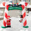 Arche de Noël avec canne à sucre avec père Noël, bonhomme de neige et pingouin
