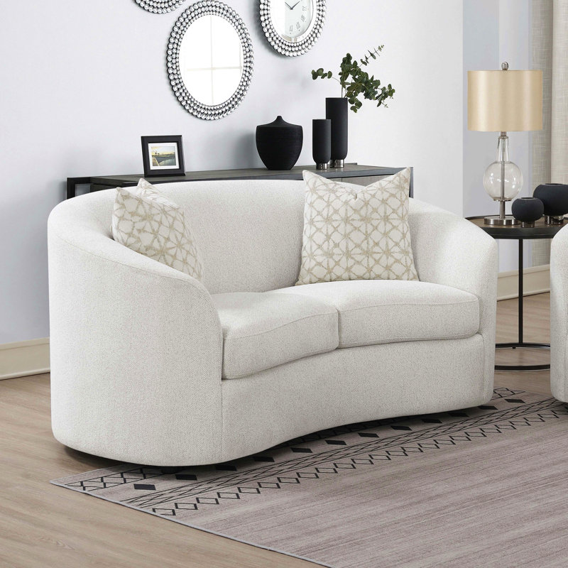 Causeuse à accoudoirs inclinés avec coussins