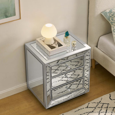 Armoire à finition miroir à trois tiroirs
