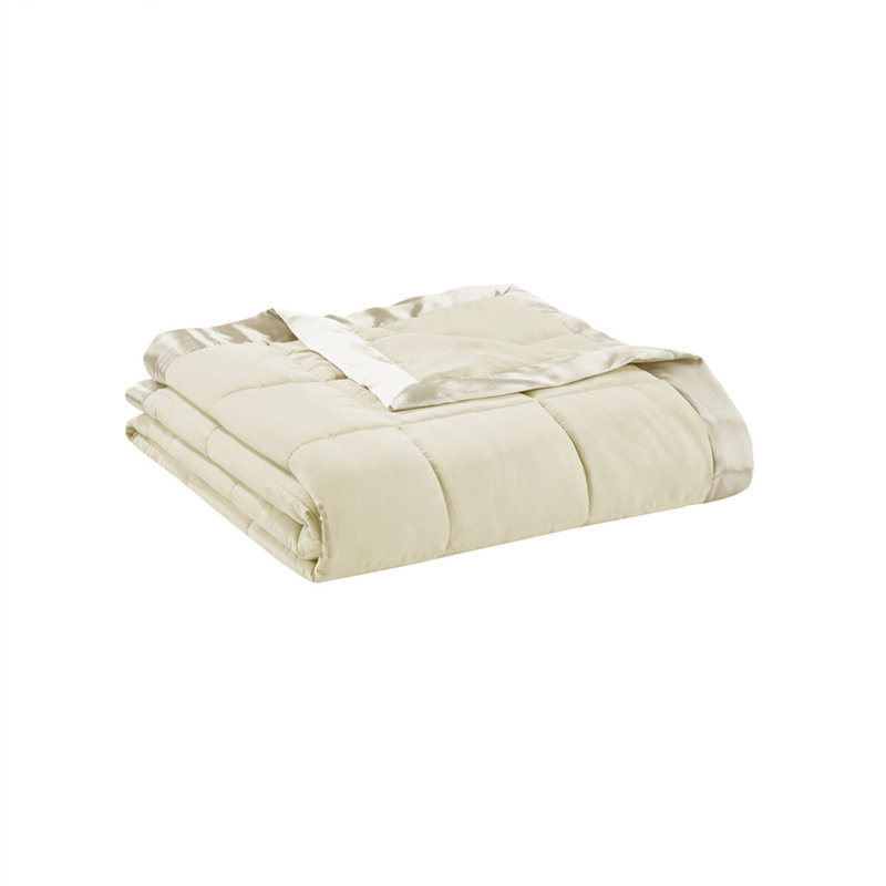 Luxueuse couverture en polyester à bordure satinée pour un confort toute l'année