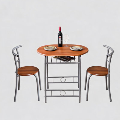 Ensemble de table et de chaises de petit-déjeuner brun classique, peu encombrant, pour cuisines et coins repas chaleureux.