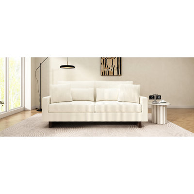 Beige revêtu de velours côtelé avec quatre coussins hauts et de style contemporain pour le salon