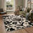 Veridiana Floral Machine Washable Beige / Black Indoor Area Rug with Non-Slip Backing-1346607916