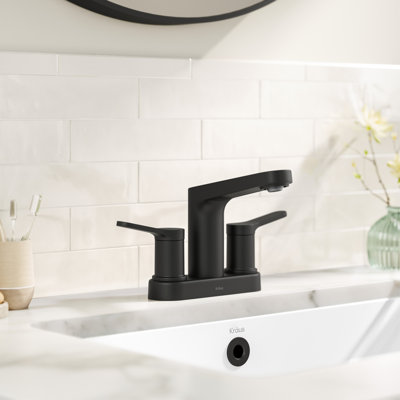 Robinet de salle de bain central KRAUS Indy avec 2 poignées, bonde escamotable et conduites d'alimentation