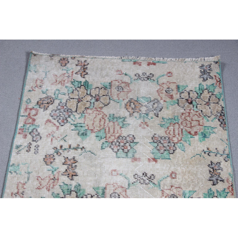 Charmant petit tapis turc beige en laine à motif floral, idéal pour les vestibules et les petits espaces