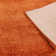Natonia Shiny Shaggy Orange Area Rug