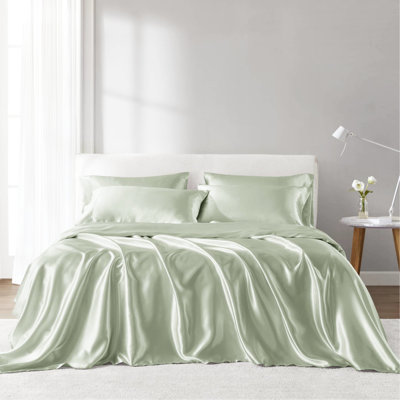 Drap simple en satin - luxe et froissé. Convient aux matelas de 16 po ou moins. Comprend 1 drap plat, 4 taies d'oreiller ajustées. Texture lisse, sommeil réparateur. Bleu foncé, 100%. Draps lavables à froid